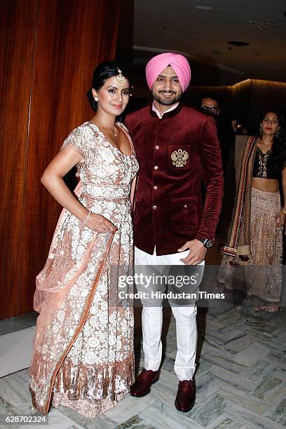 Indian Cricketer Harbhajan Singh with his wife and actor Geeta Basra during the wedding reception of Indian Cricketer Yuvraj Singh and Bollywood...