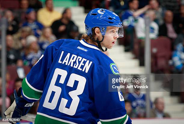 Philip Larsen of the Vancouver Canucks looks on from the bench during their NHL game against the Minnesota Wild at Rogers Arena November 29, 2016 in...