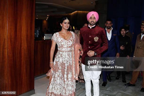 Indian Cricketer Harbhajan Singh with his wife and actor Geeta Basra during the wedding reception of Indian Cricketer Yuvraj Singh and Bollywood...