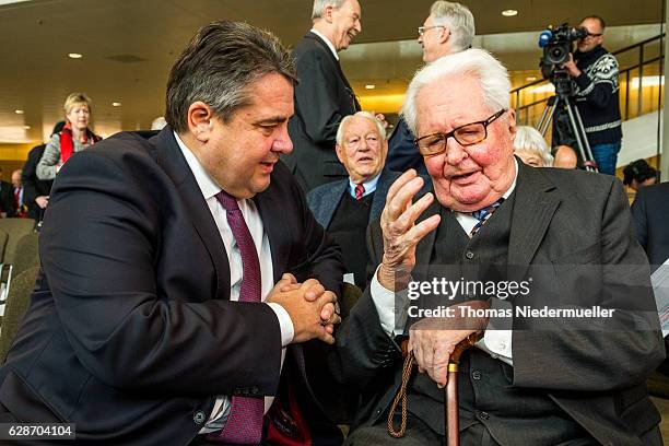 Vice Chancellor and Economy and Energy Minister Sigmar Gabriel talks to Hans-Jochen Vogel, former German minister and former lord mayor of Munich...