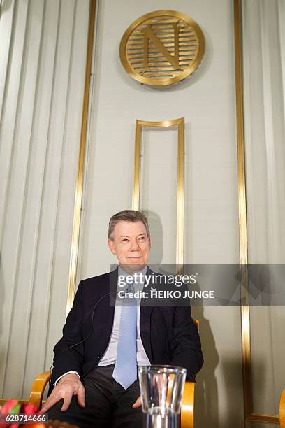The 2016 Nobel Peace prize laureate Colombian President Juan Manuel Santos speaks during a press conference in the Norwegian Nobel Institute in Oslo,...