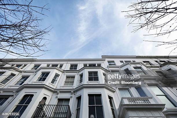 Residential properties stand in the Kensington area of London, U.K., on Friday, Dec. 9, 2016. Land values in central London's best districts fell...