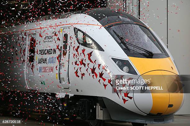 The first Hitachi Intercity Express Programme train is unveiled during a press event at Hitachi's manufacturing plant in Newyton Aycliffe, north-east...