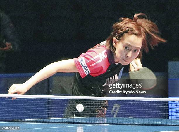 Kasumi Ishikawa of Japan plays during her first-round singles match of the World Tour Grand Finals table tennis tournament against South Korean Suh...
