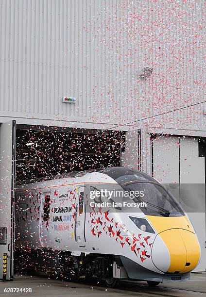 The first British-built Intercity Express train is unveiled in front of invited guests at the Hitachi Rail Europe site on December 9, 2016 in Newton...