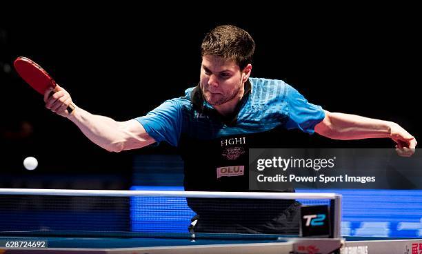 Dimitrij Ovtcharov of Germany in action against Tang Peng of Hong Kong in their Men Singles Round of 16 match during the Seamaster Qatar 2016 ITTF...