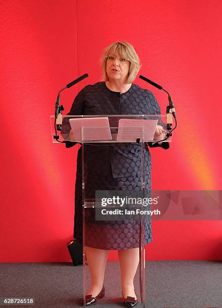 Managing Director of Hitachi Rail Europe, Karen Boswell OBE, speaks to guests during a visit to the Hitachi Rail Europe site on December 9, 2016 in...