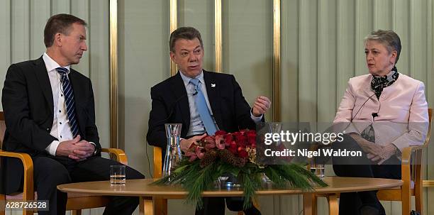 Director of the Norwegian Nobel Institute and Secretary of the Norwegian Nobel Committee Olav Njolstad, President Juan Manuel Santos of Colombia and...