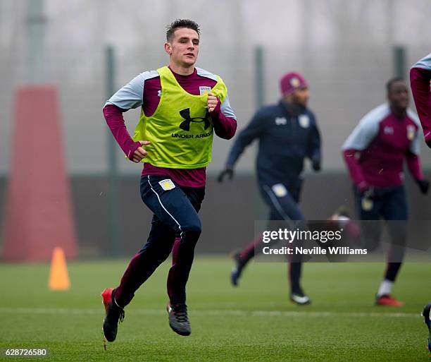 Ashley Westwood of Aston Villa in action during a Aston Villa training session at the club's training ground at Bodymoor Heath on December 09, 2016...