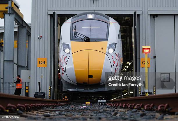 The first British-built Intercity Express train is unveiled in front of invited guests at the Hitachi Rail Europe siteon December 9, 2016 in Newton...