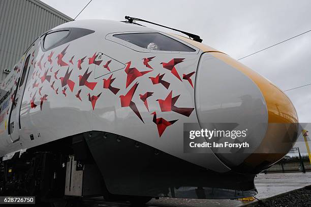 The first British-built Intercity Express train is unveiled in front of invited guests at the Hitachi Rail Europe siteon December 9, 2016 in Newton...