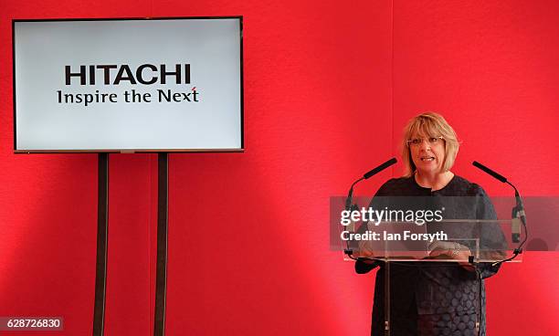 Managing Director of Hitachi Rail Europe, Karen Boswell OBE, speaks to guests during a visit to the Hitachi Rail Europe site on December 9, 2016 in...
