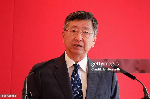 Japanese Ambassador to the UK, Koji Tsuruoka, speaks to guests during a visit to the Hitachi Rail Europe site on December 9, 2016 in Newton Aycliffe,...