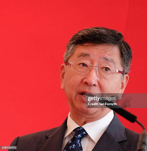 Japanese Ambassador to the UK, Koji Tsuruoka, speaks to guests during a visit to the Hitachi Rail Europe site on December 9, 2016 in Newton Aycliffe,...