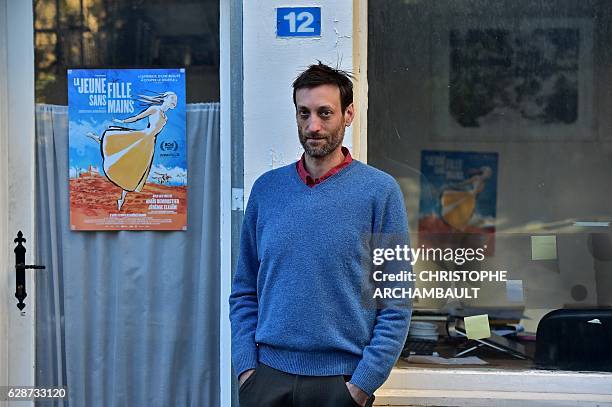 French animation film designer Sebastien Laudenbach poses outside his workshop in Paris on November 30, 2016. "The young woman without hands" is the...