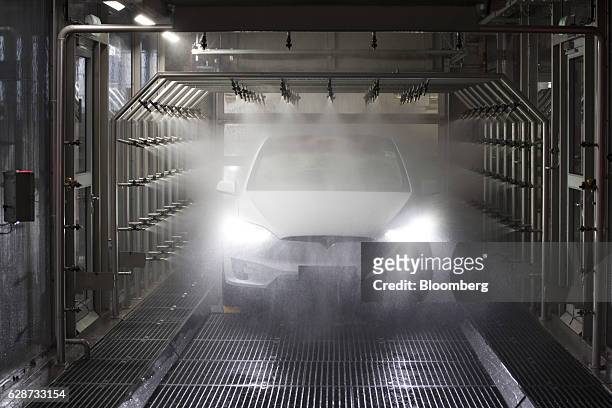 Tesla Model X sports utility vehicle undergoes rain testing during assembly for the European market at the Tesla Motors Inc. Factory in Tilburg,...