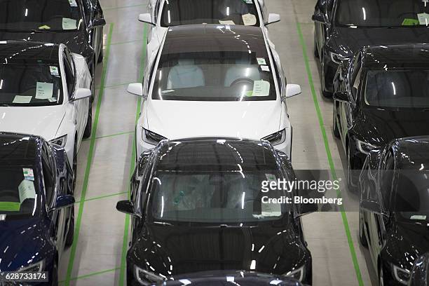 Tesla Model X sports utility vehicles stand on the factory floor after assembly for the European market at the Tesla Motors Inc. Factory in Tilburg,...