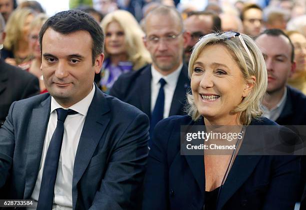 President of French far-right Front National party Marine Le Pen and FN's vice-president Florian Philippot attend a meeting on the theme "Health :...