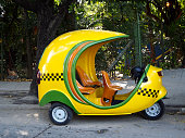Cocotaxi parked in a street of Havana