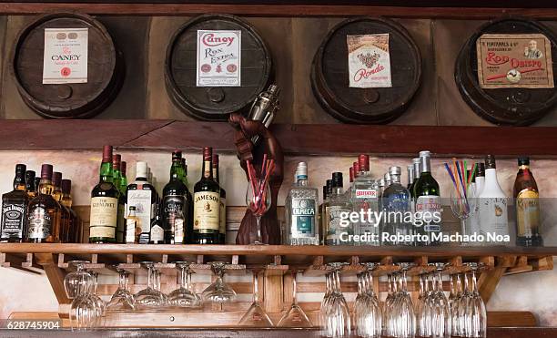 Emilio Bacardi House of Rum: brand name labels in oak wooden barrels of the drink. Caney, Ronda Brand in bar. The place is a tourist attraction in...