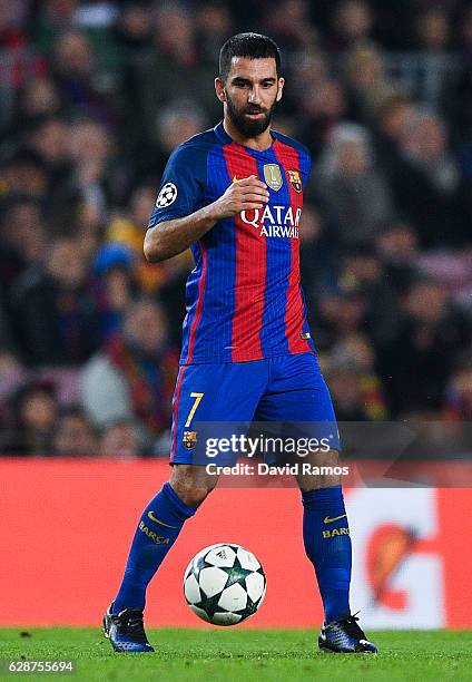 Ardan Turan of FC Barcelona runs with the ball during the UEFA Champions League match between FC Barcelona and VfL Borussia Moenchengladbach at Camp...