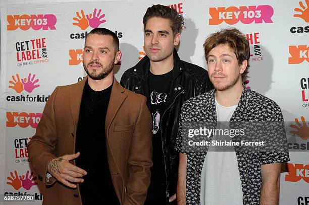 James Bourne, Matt Willis and Charlie Simpson of Busted attend Key 103 Christmas Live at Manchester Arena on December 9, 2016 in Manchester, England.