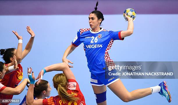 Croatia's Zana Maric prepares to throw the ball during the Women's European Handball Championship Group D match between Romania and Croatia in...