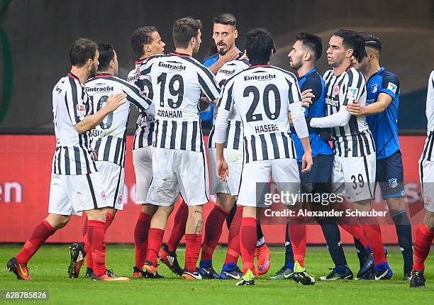 Timothy Chandler of Frankfurt strangles Sandro Wagner of Hoffenheim and gets the red card during the Bundesliga match between Eintracht Frankfurt and...