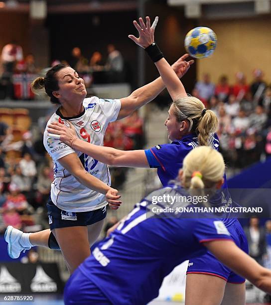 Norway's Nora Mork prepares to throw the ball during the Women's European Handball Championship Group D match between Norway and Russia in...