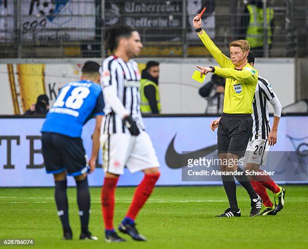 Referee Christian Dingert shows Timothy Chandler of Frankfurt the red card during the Bundesliga match between Eintracht Frankfurt and TSG 1899...