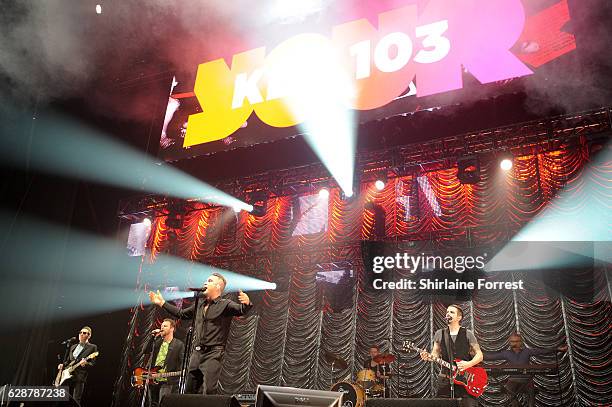 Robbie Williams performs on stage at Key 103 Christmas Live at Manchester Arena on December 9, 2016 in Manchester, England.