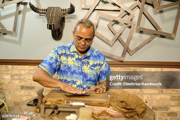 Orlando Jimenez leads Rum Tasting and Cigar Rolling Event during CMT Story Behind The Songs LIV + Weekend Day 2 at Sandals Royal Bahamian Spa Resort...