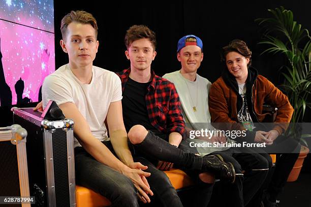 Brad Simpson, James McVey, Connor Ball and Tristan Evans of the Vamps pose backstage at Key 103 Christmas Live at Manchester Arena on December 9,...