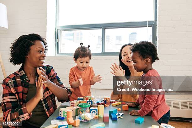 day in daycare - play date stock pictures, royalty-free photos & images