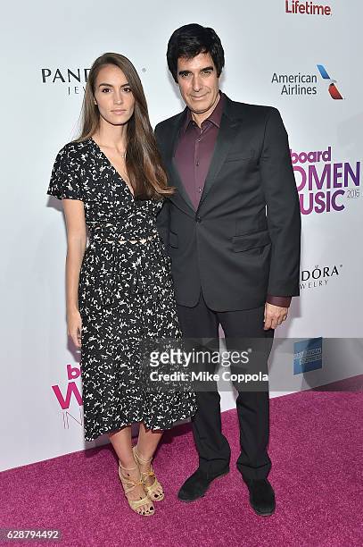 Chloe Gosselin and David Copperfield attend the Billboard Women in Music 2016 event on December 9, 2016 in New York City.