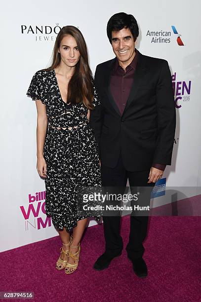 Chloe Gosselin and David Copperfield attend the Billboard Women in Music 2016 event on December 9, 2016 in New York City.