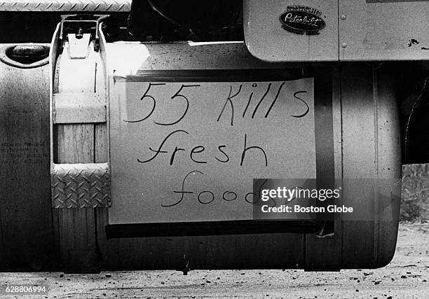 Sign on a gasoline tank during an independent trucker demonstration blockade in front of the Chelsea, Mass., New England Produce Center reads, "55...