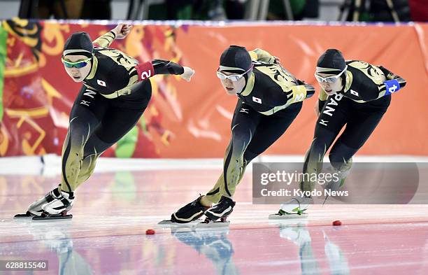 Russia - Misaki Oshigiri , Maki Tabata , and Nana Takagi of Japan compete in the women's team pursuit quarterfinals at the Adler Arena Skating Center...