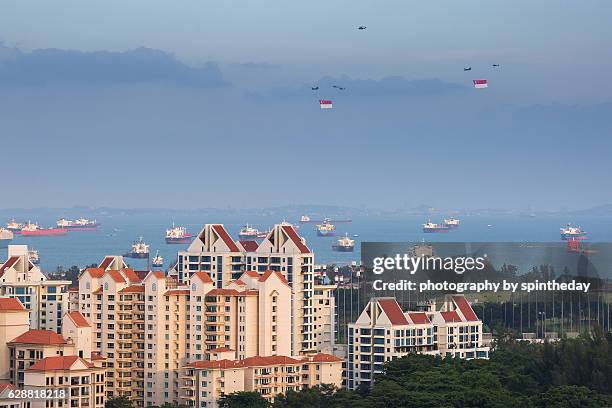 the national day of singapore - singapore national flag stock pictures, royalty-free photos & images