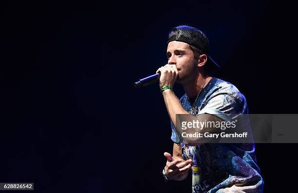 Rapper Jake Miller performs on stage during Z100 & Coca-Cola All Access Lounge at Z100's Jingle Ball 2016 Presented by Capital One pre-show at...