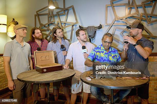 Orlando Jimenez leads Rum Tasting and Cigar Rolling Event joined by recording artists Jon Jones, James Young, Chris Thompson, and Mike Eli of Eli...