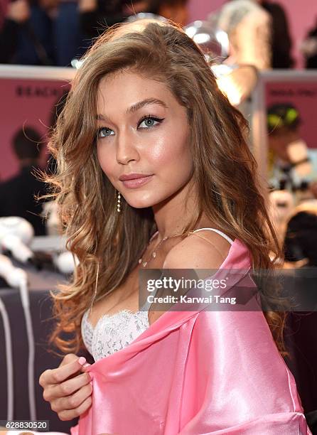 Gigi Hadid has her Hair & Makeup done prior to the 2016 Victoria's Secret Fashion Show at the Grand Palais on November 30, 2016 in Paris, France.