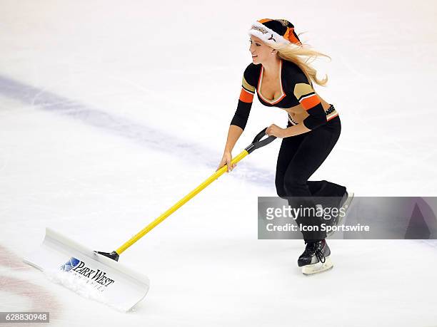 Anaheim Ducks power player in a Santa hat on the ice during a break in the action of the first period of a game against the Carolina Hurricanes, on...