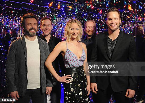 Actor Michael Sheen, actress Jennifer Lawrence; actor Chris Pratt, writer Jon Spaihts and director Morten Tyldum pose at the photo call for Columbia...