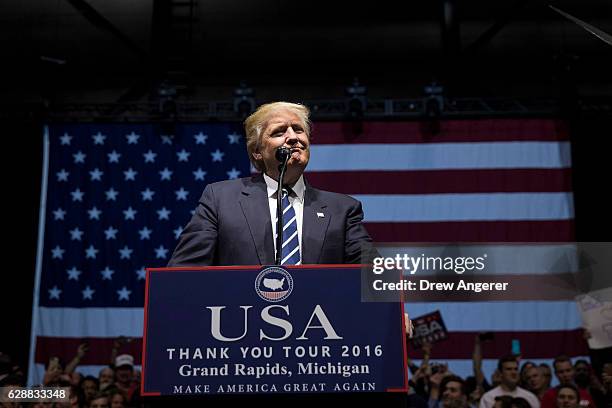 President-elect Donald Trump speaks at the DeltaPlex Arena, December 9, 2016 in Grand Rapids, Michigan. President-elect Donald Trump is continuing...