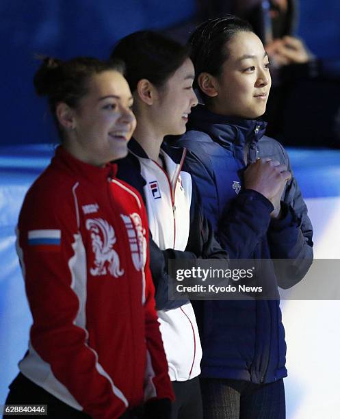 Russia - Russia's Adelina Sotnikova , South Korea's Kim Yu Na and Japan's Mao Asada participate in a practice session for a figure skating exhibition...