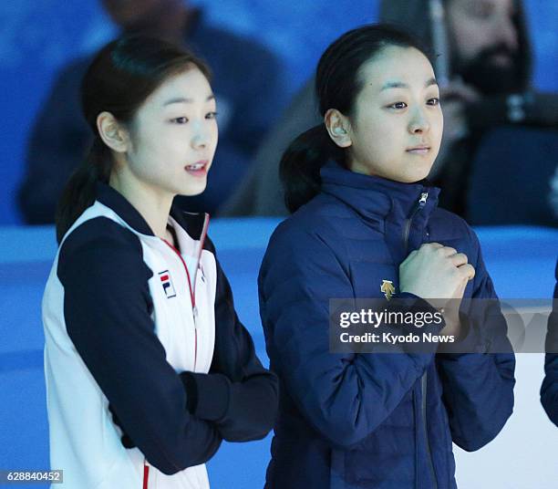 Russia - South Korea's Kim Yu Na and Japan's Mao Asada await a practice session for a figure skating exhibition at the Winter Olympics in Sochi,...