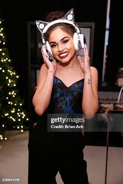 Maggie Lindemann poses with Cat Ear Wireless Headphones at Z100's artist gift lounge during Jingle Ball 2016 at Madison Square Garden on December 9,...