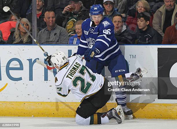 Spencer Watson of the Mississauga Steelheads slams into Robert Thomas of the London Knights during an OHL game at Budweiser Gardens on December 9,...
