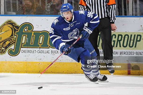 Spencer Watson of the Mississauga Steelheads skates with the puck against the London Knights during an OHL game at Budweiser Gardens on December 9,...